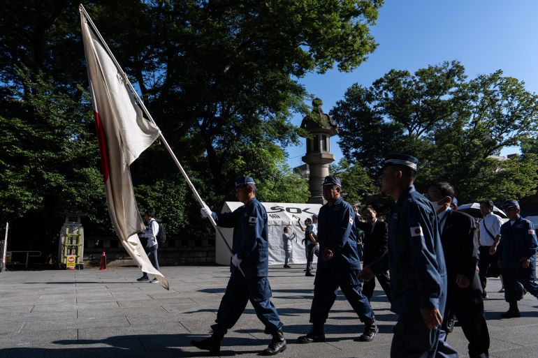 Japan lifts arms export ban, ending decades of pacifist policy.
