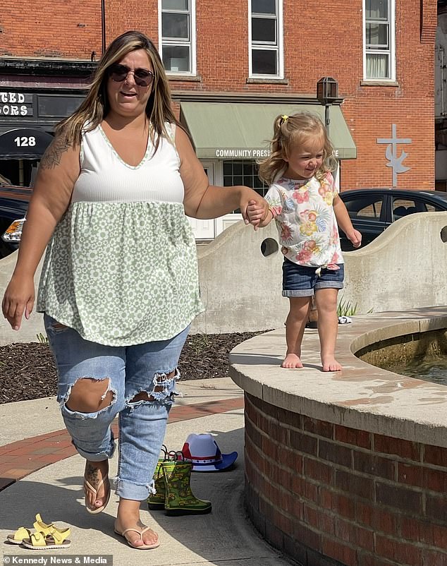 Mother retreats from life after realizing she can no longer fit on playground slide.